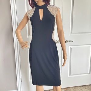 Beautiful cocktail/party dress by Xscape.